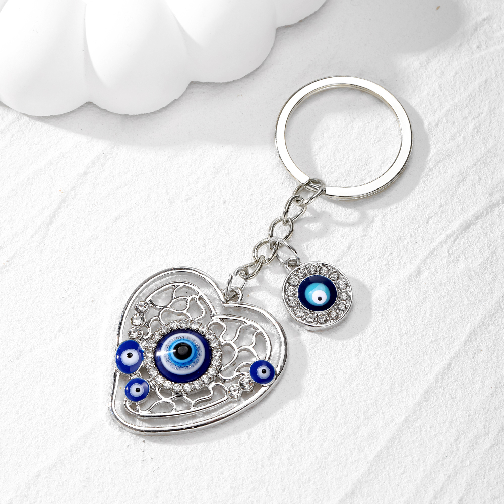 Casual Vintage Style Simple Style Devil's Eye Heart Shape Alloy Inlay Rhinestones Bag Pendant Keychain display picture 1