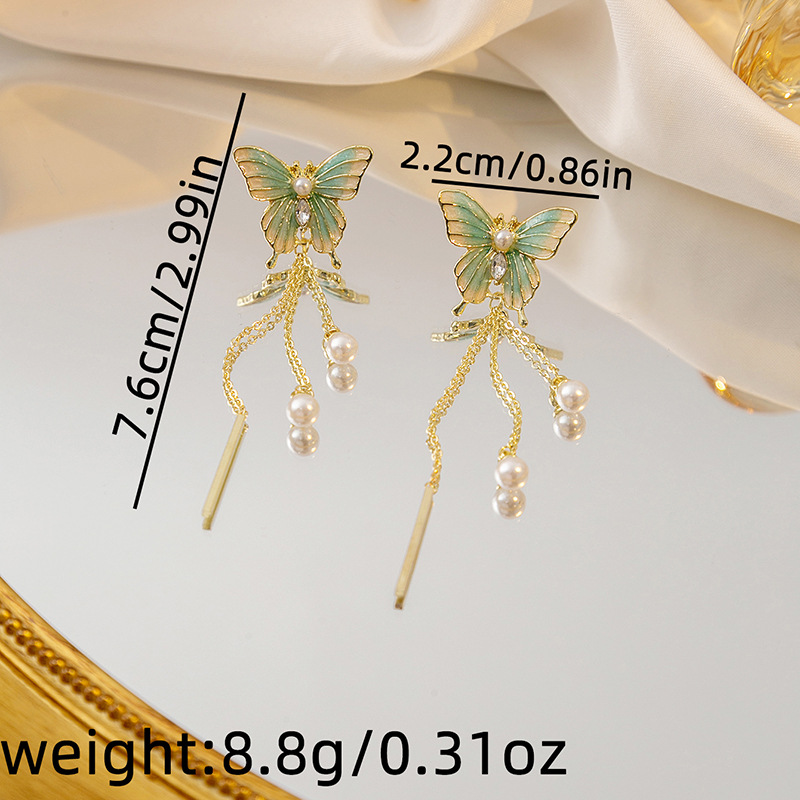 1 Pair Sweet Simple Style Butterfly Tassel Pearl Alloy Drop Earrings display picture 5