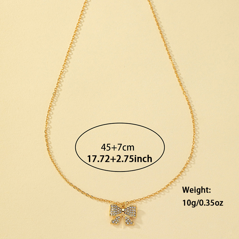 Sweet Bow Knot Alloy Zinc Inlay Artificial Diamond Women's Pendant Necklace display picture 3