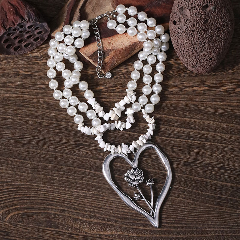 Commute Heart Shape Flower Imitation Pearl Alloy Howlite Knitting Women's Three Layer Necklace display picture 24