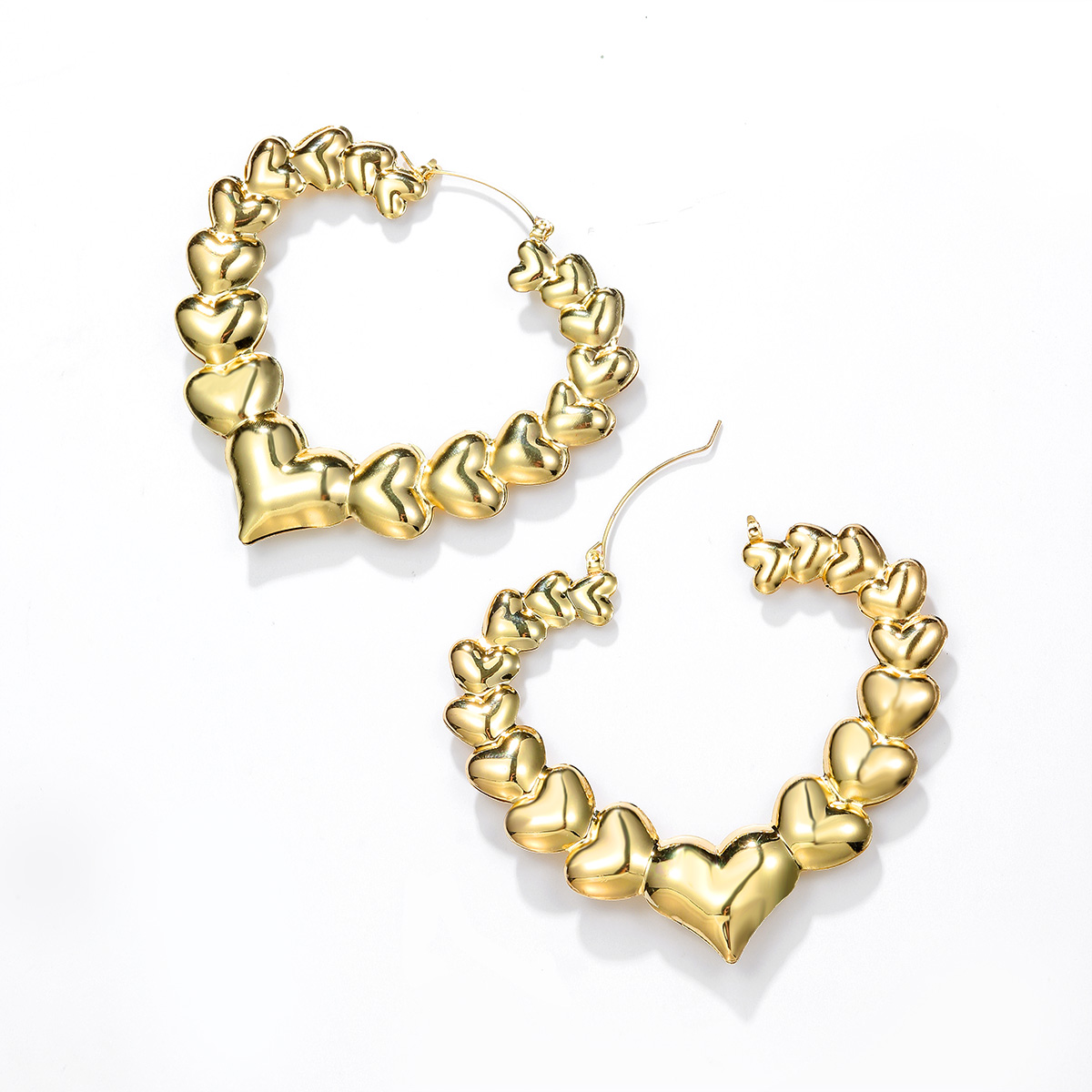 1 Pair Exaggerated Heart Shape Plating Iron Hoop Earrings display picture 17