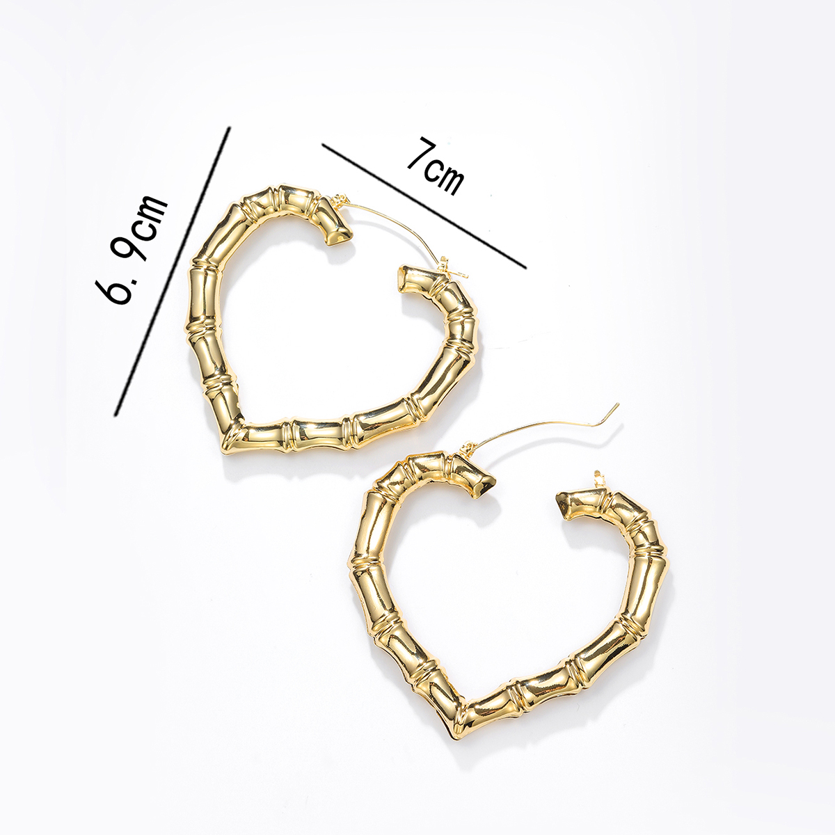 1 Pair Exaggerated Heart Shape Plating Iron Hoop Earrings display picture 12