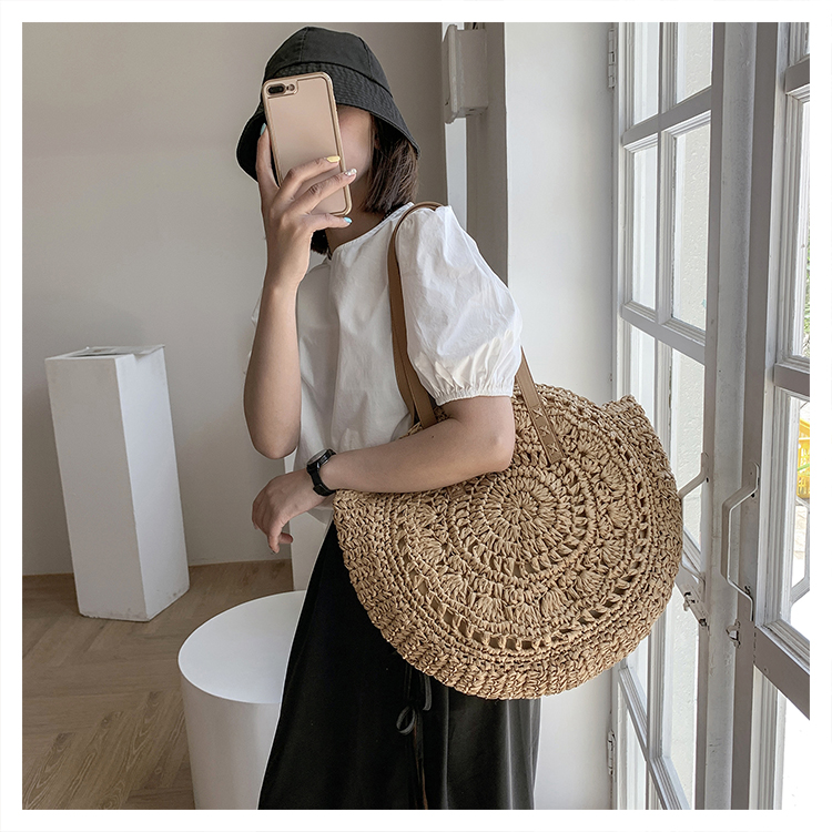 Women's Spring&summer Straw Solid Color Vacation Round Open Straw Bag display picture 1