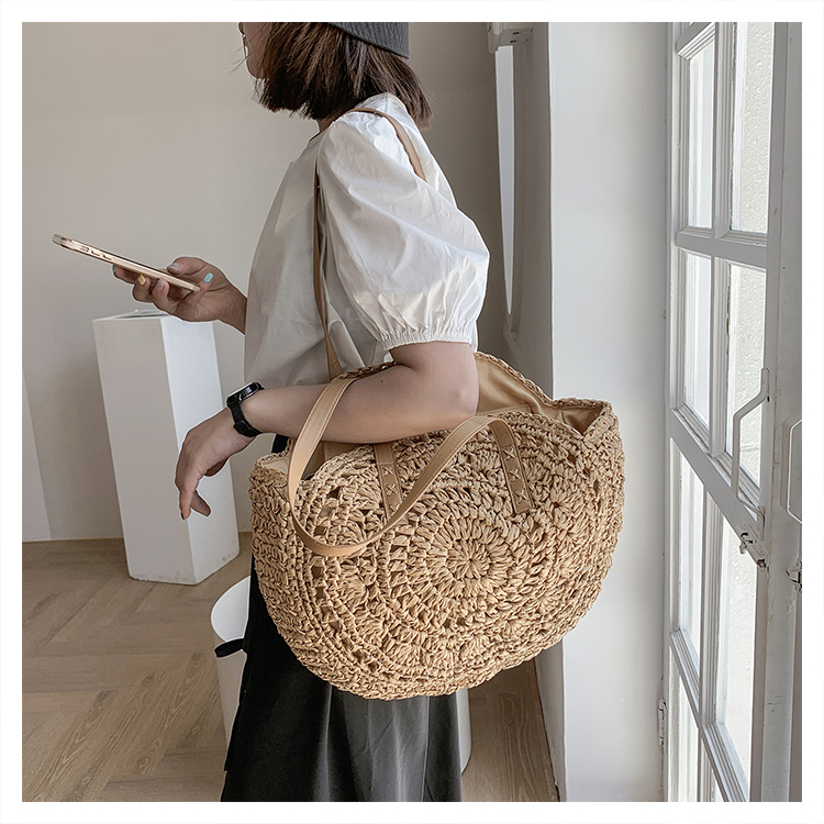 Women's Spring&summer Straw Solid Color Vacation Round Open Straw Bag display picture 5