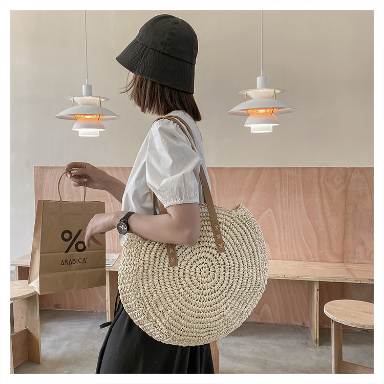 Women's Spring&summer Straw Solid Color Vacation Round Open Straw Bag display picture 11