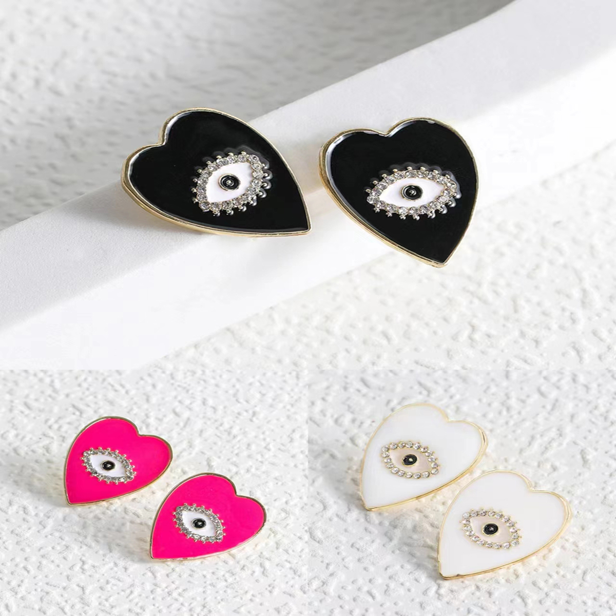 1 Pair Fashion Heart Shape Eye Alloy Enamel Plating Inlay Rhinestones Women's Ear Studs display picture 7