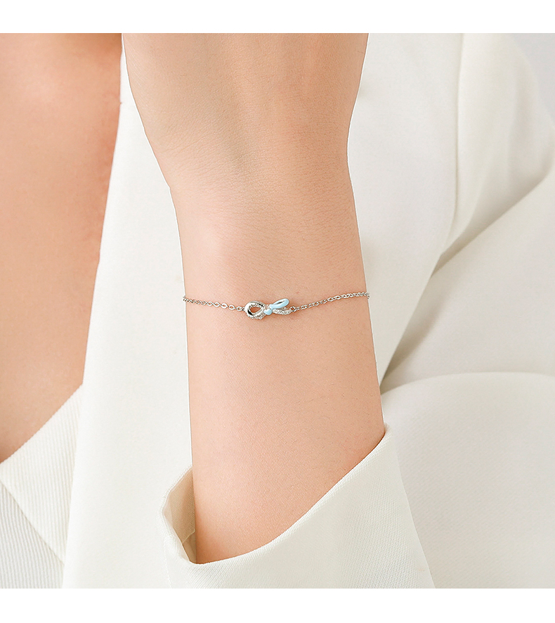 Simple Style Bow Knot Sterling Silver Epoxy Inlay Zircon Bracelets display picture 1