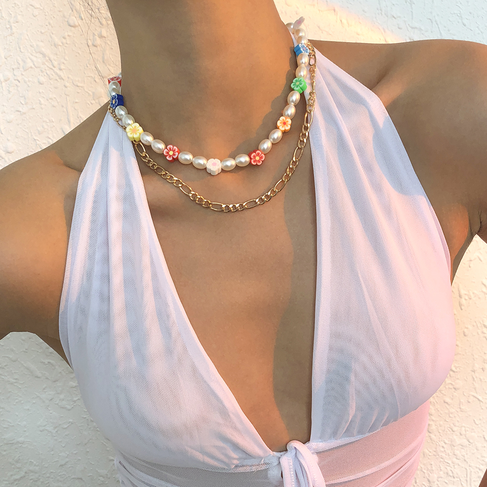 Hawaiian Vacation Bohemian Flower Imitation Pearl Alloy Soft Clay Beaded Layered Women's Layered Necklaces display picture 2