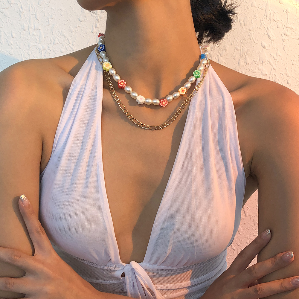 Hawaiian Vacation Bohemian Flower Imitation Pearl Alloy Soft Clay Beaded Layered Women's Layered Necklaces display picture 4