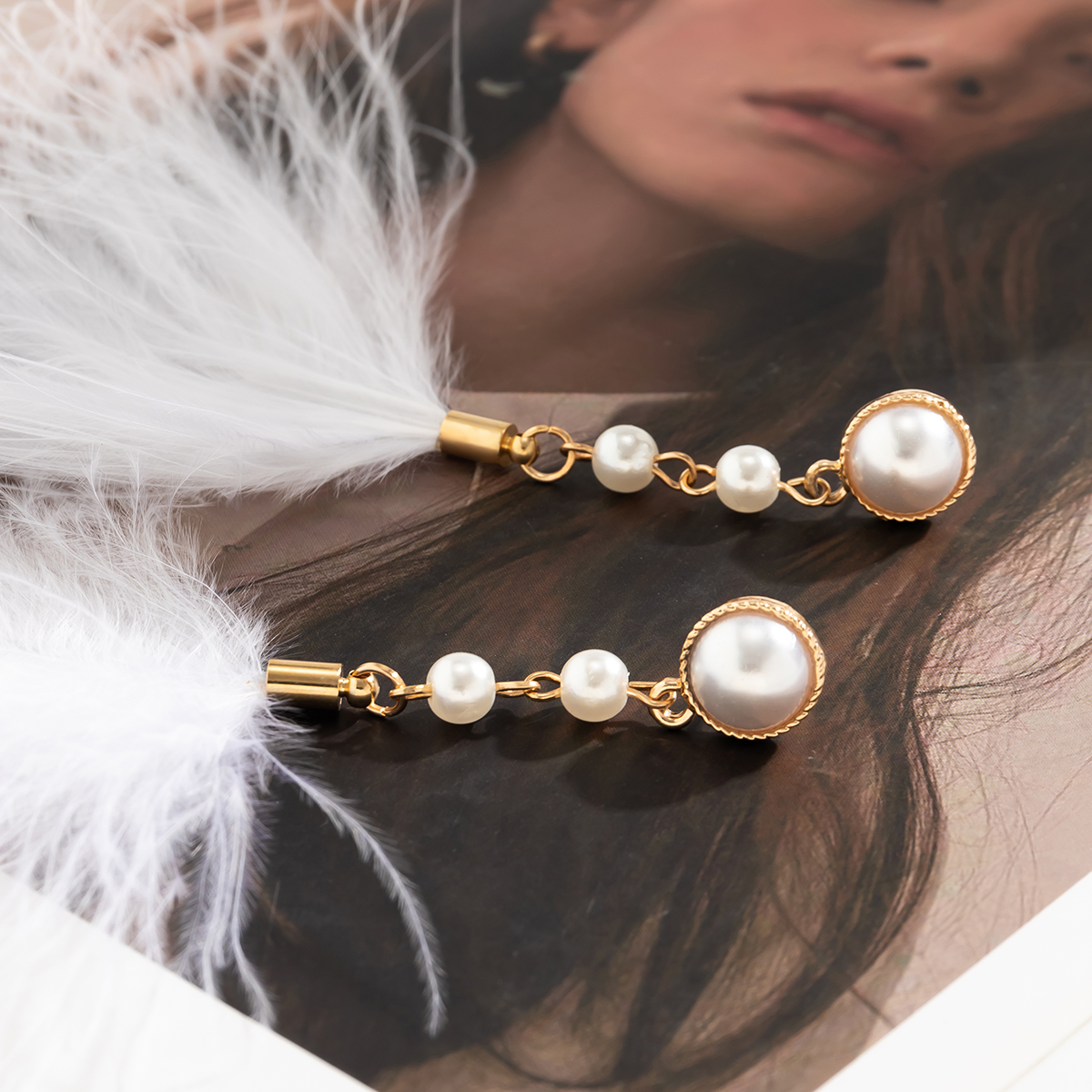 Simple Style Commute Solid Color Imitation Pearl Feather Inlay Artificial Pearls Women's Drop Earrings display picture 4