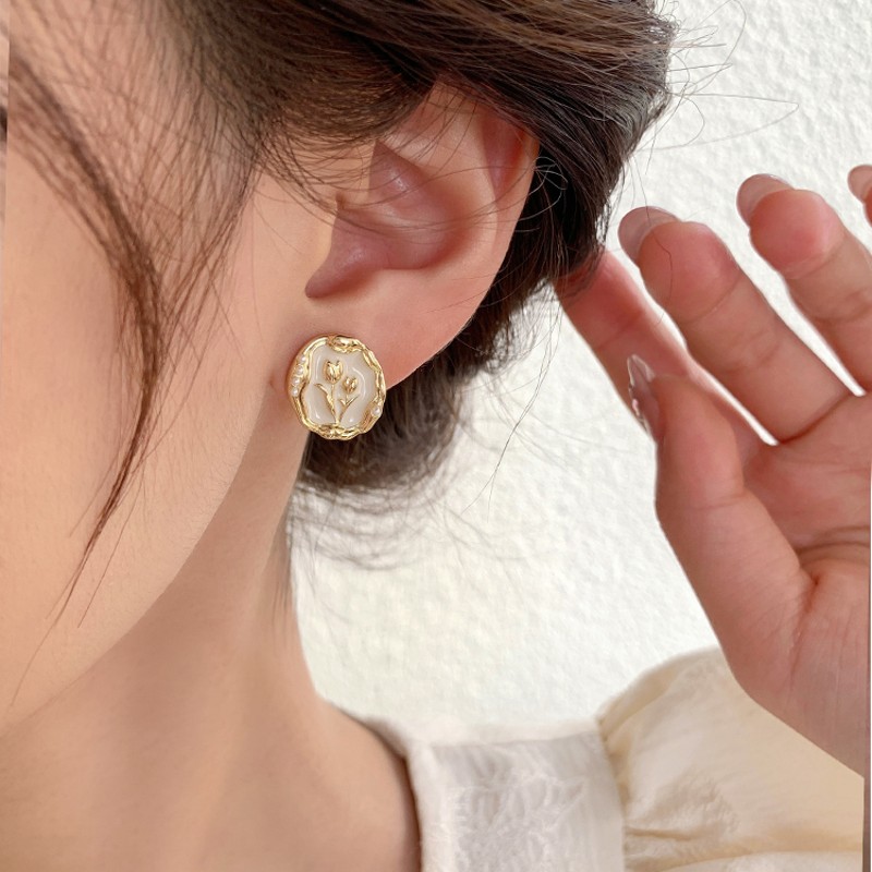 Sweet Korean Style Flower Alloy Enamel Inlay Artificial Pearls Women's Ear Studs display picture 5