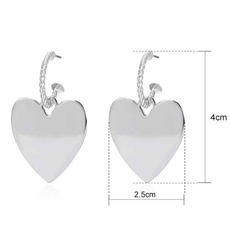 Casual Modern Style Heart Shape Key Alloy Metal Copper Asymmetrical Pearl Plating 18k Gold Plated Gold Plated Silver Plated Women's Drop Earrings display picture 4