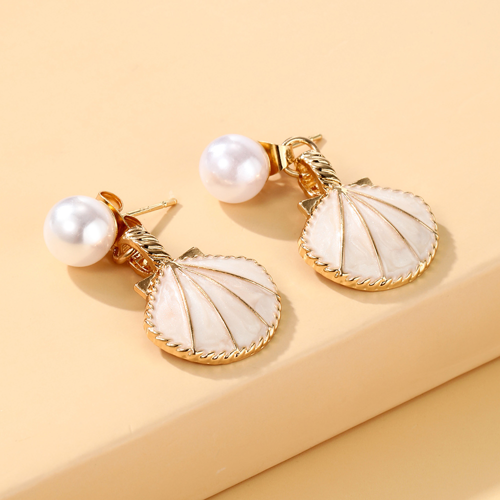 Elegant Starfish Flower Bow Knot Alloy Plating Inlay Artificial Pearls Rhinestones Gold Plated Women's Earrings display picture 8