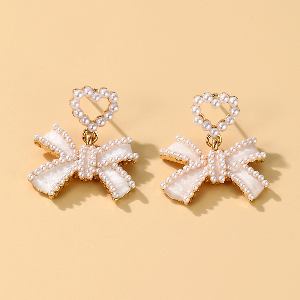 Elegant Starfish Flower Bow Knot Alloy Plating Inlay Artificial Pearls Rhinestones Gold Plated Women's Earrings display picture 14