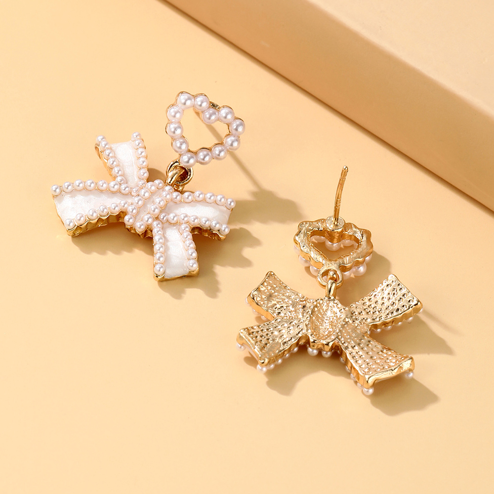 Elegant Starfish Flower Bow Knot Alloy Plating Inlay Artificial Pearls Rhinestones Gold Plated Women's Earrings display picture 15