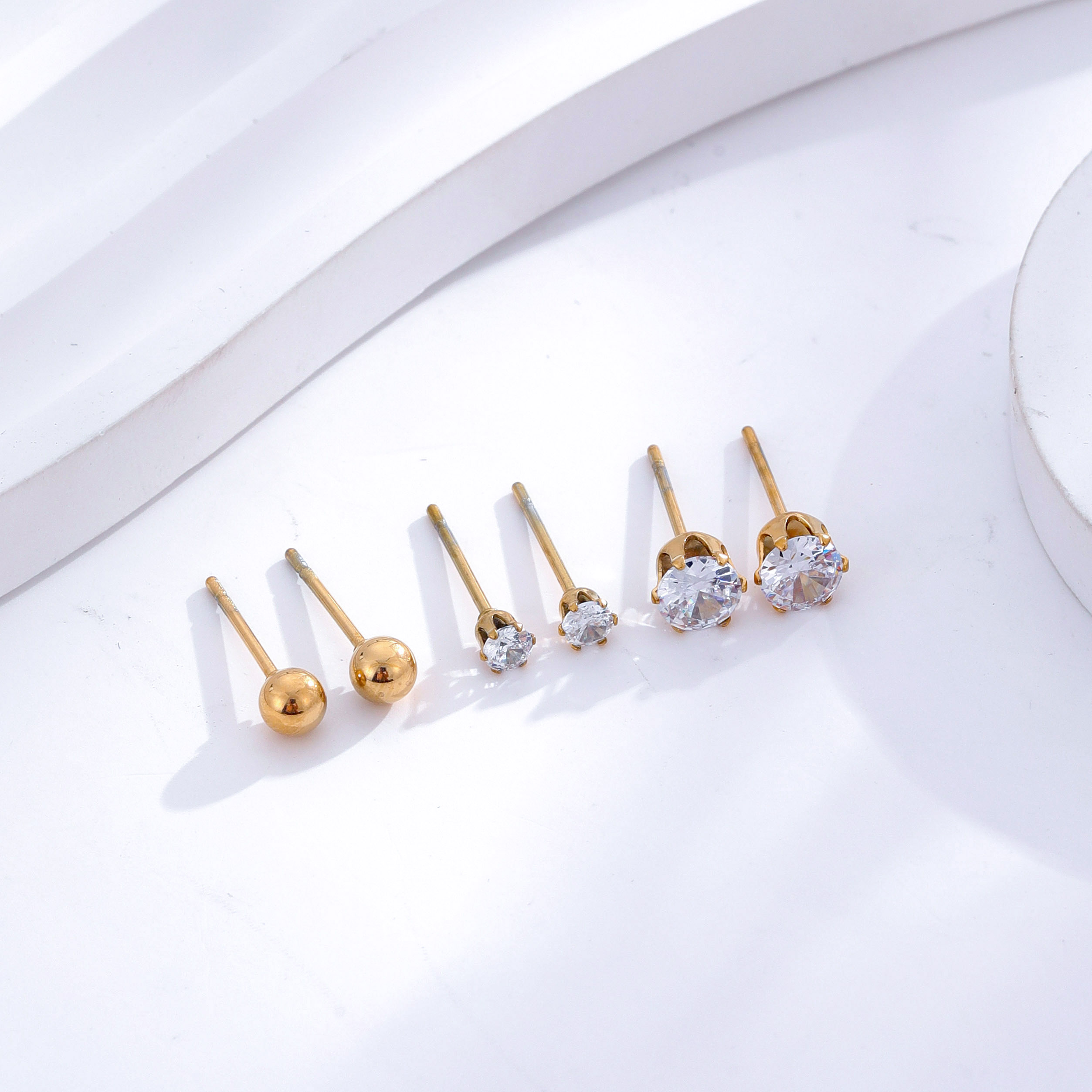 1 Set 3 Pairs Casual Simple Style Heart Shape Roman Numeral Butterfly Plating Inlay 304 Stainless Steel Rhinestones Shell 18K Gold Plated Ear Studs display picture 2