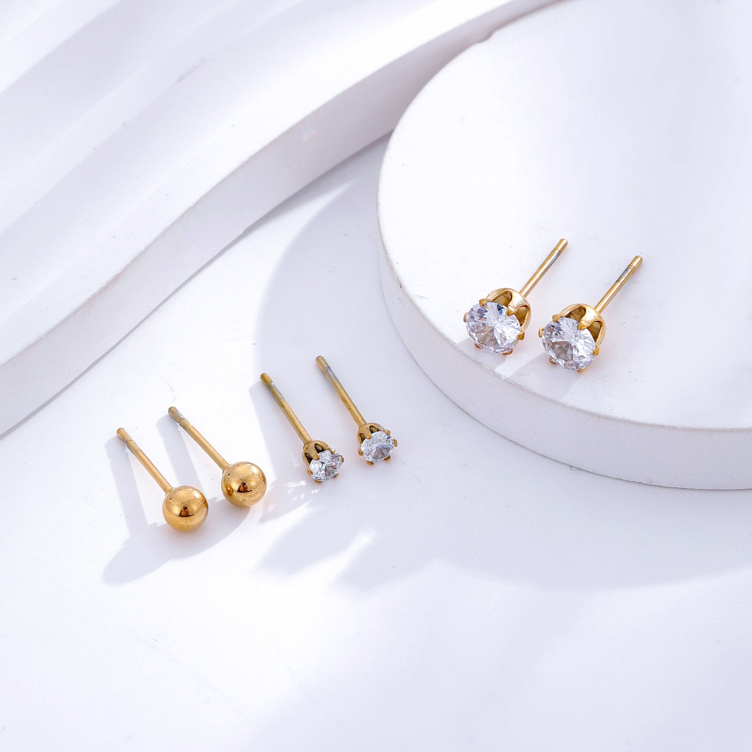 1 Set 3 Pairs Casual Simple Style Heart Shape Roman Numeral Butterfly Plating Inlay 304 Stainless Steel Rhinestones Shell 18K Gold Plated Ear Studs display picture 1