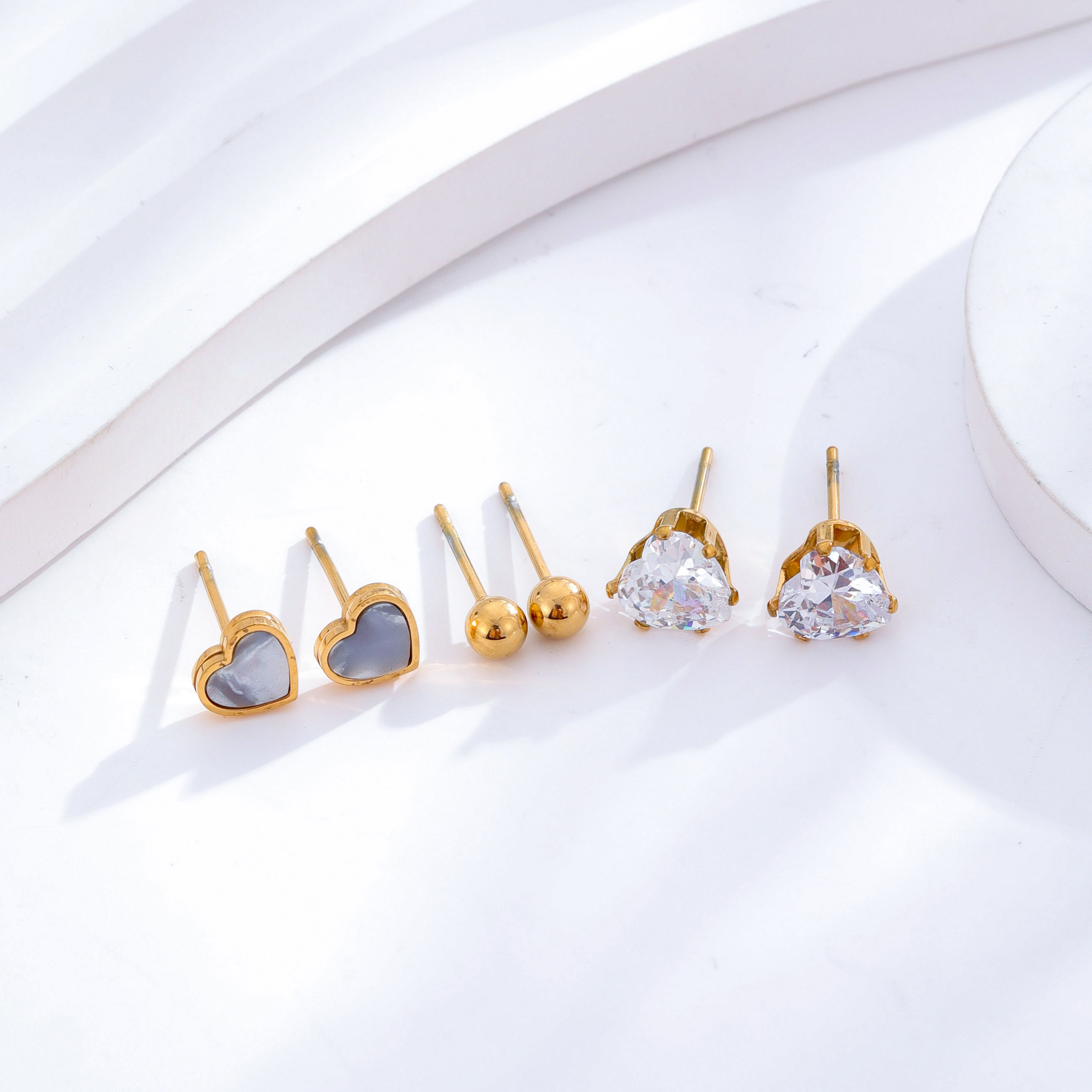1 Set 3 Pairs Casual Simple Style Heart Shape Roman Numeral Butterfly Plating Inlay 304 Stainless Steel Rhinestones Shell 18K Gold Plated Ear Studs display picture 3