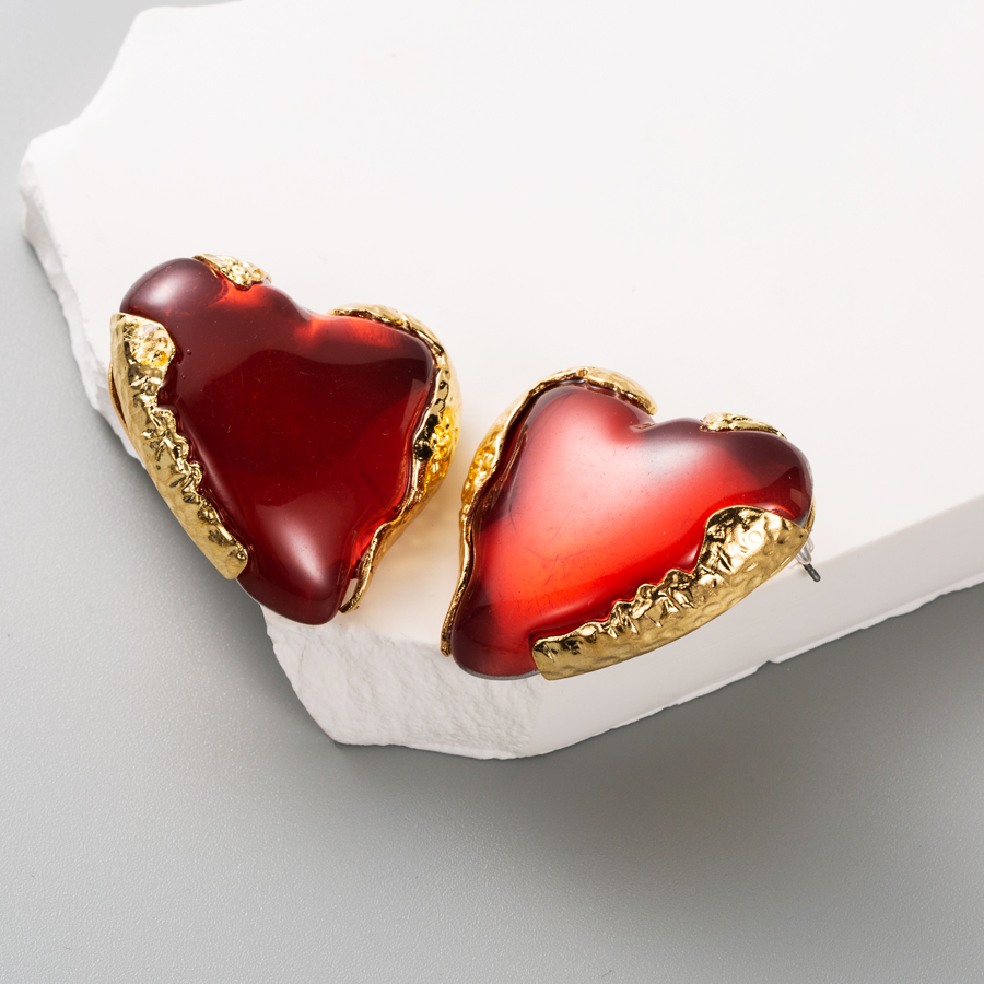Elegant Heart Shape Alloy Resin Inlay Resin Rhinestones Gold Plated Women's Earrings Ear Studs display picture 4