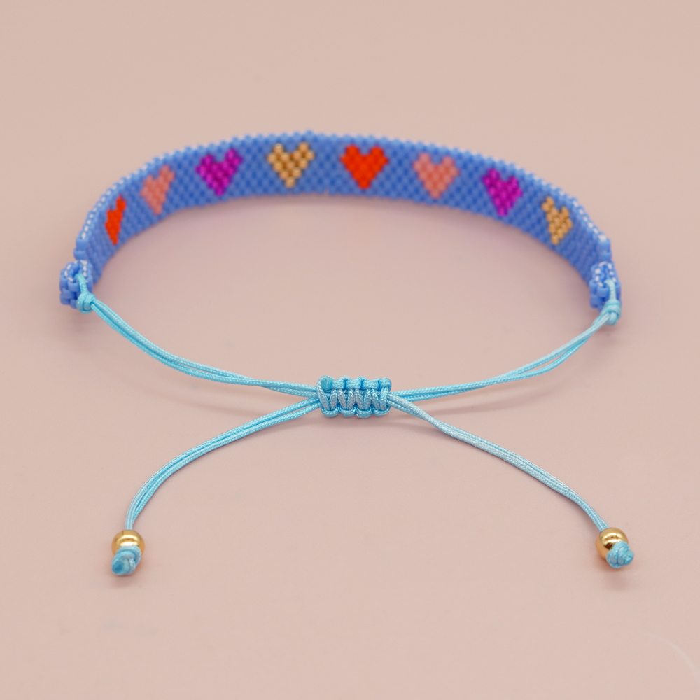 Simple Style Peach Heart Shape Flower Glass Braid Woven Belt Women's Bracelets display picture 49