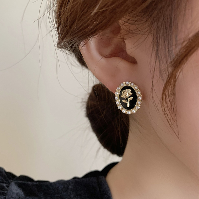Korean Style Flower Alloy Inlay Artificial Pearls Women's Ear Studs display picture 13