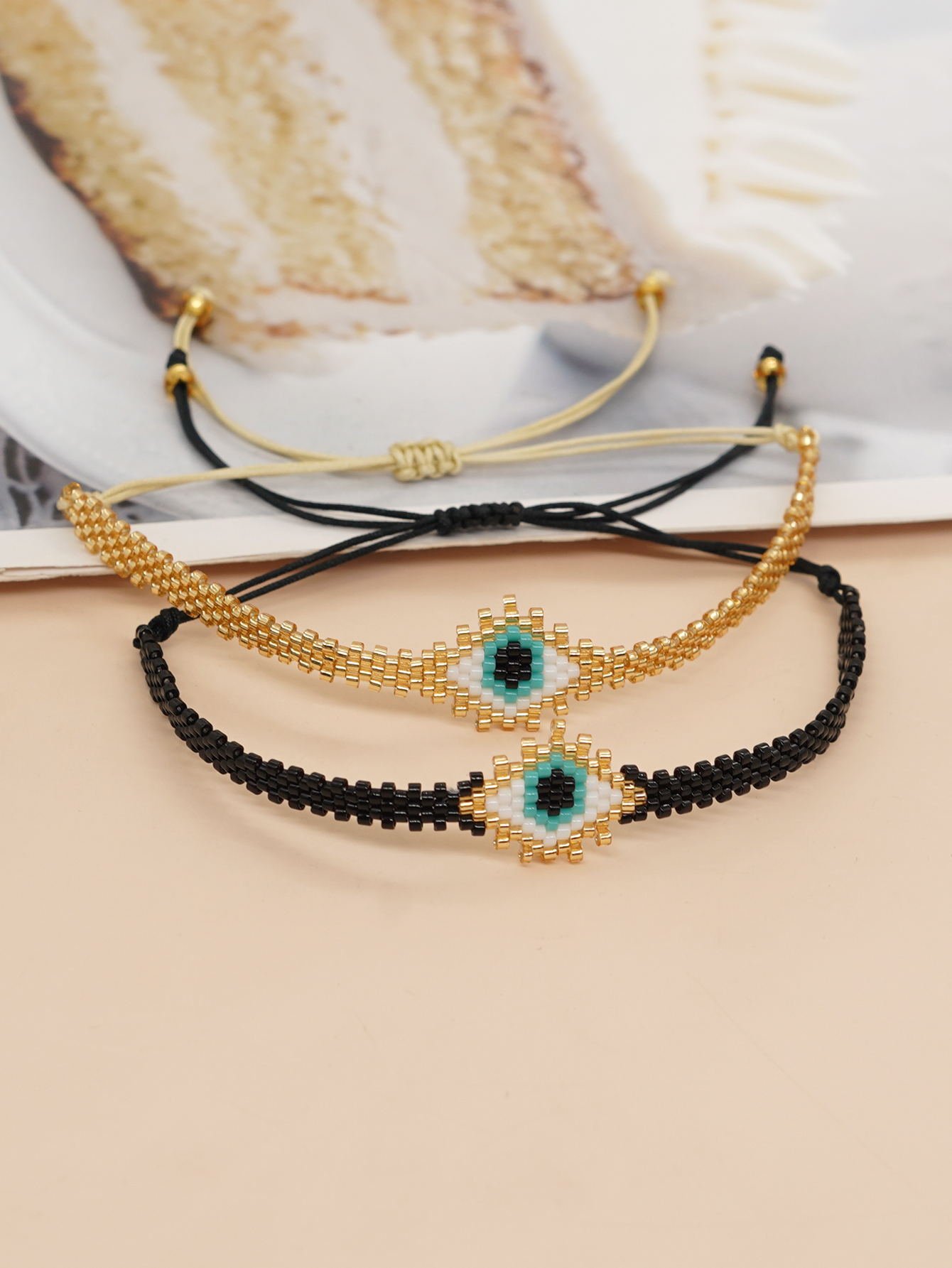 Bohemian Devil's Eye Heart Shape Flower Glass Rope Braid Women's Bracelets display picture 2