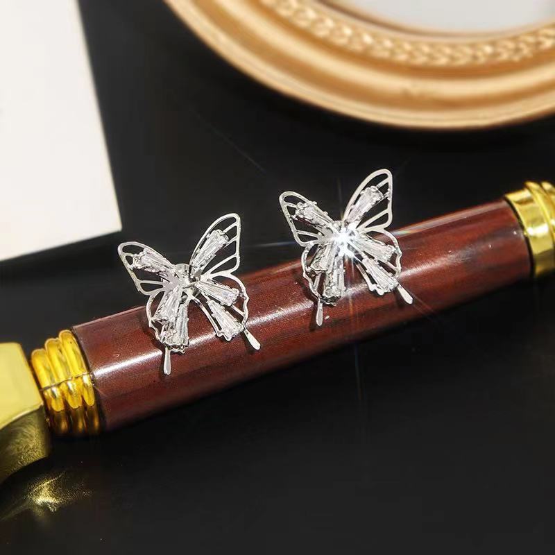 Streetwear Butterfly Alloy Hollow Out Inlay Zircon Women's Ear Studs display picture 1