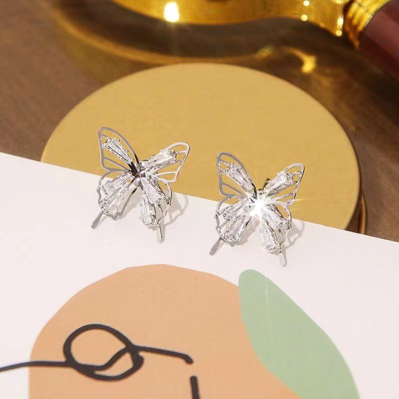 Streetwear Butterfly Alloy Hollow Out Inlay Zircon Women's Ear Studs display picture 3