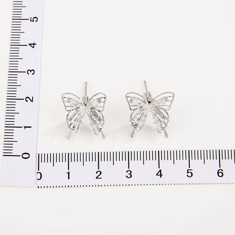 Streetwear Butterfly Alloy Hollow Out Inlay Zircon Women's Ear Studs display picture 5