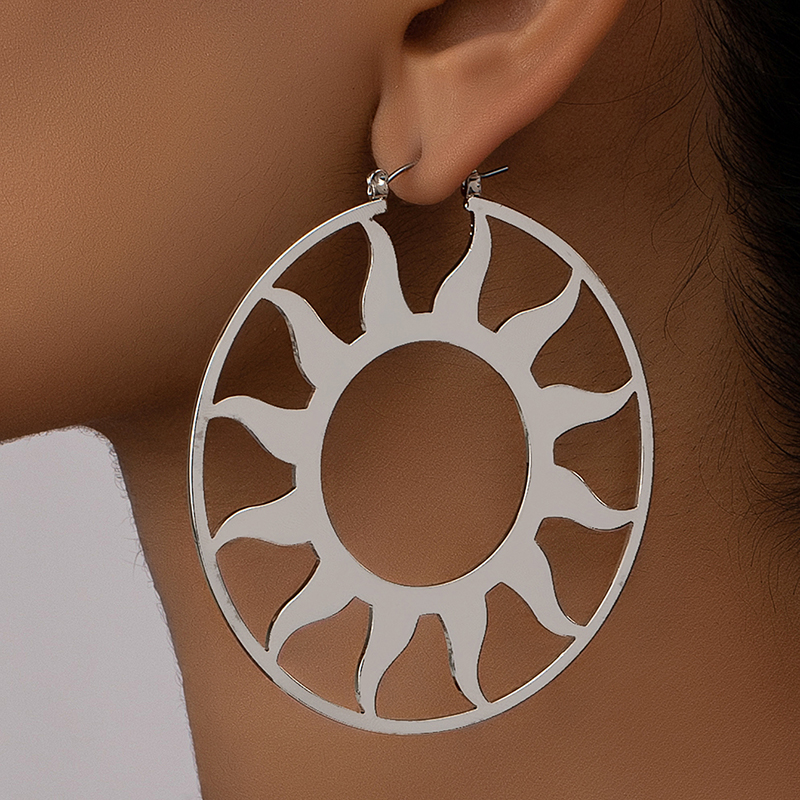 1 Pair Exaggerated Artistic Sun Hollow Out Alloy Hoop Earrings display picture 6