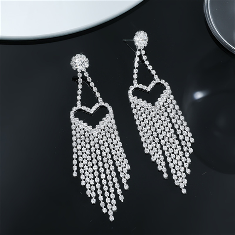 Glam Shiny Tassel Heart Shape Rhinestone Hollow Out Inlay Rhinestones Silver Plated Women's Drop Earrings display picture 4