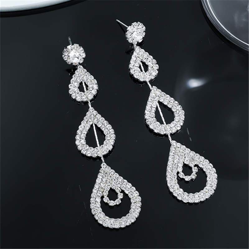 Glam Shiny Water Droplets Rhinestone Plating Hollow Out Inlay Rhinestones Silver Plated Women's Drop Earrings display picture 4