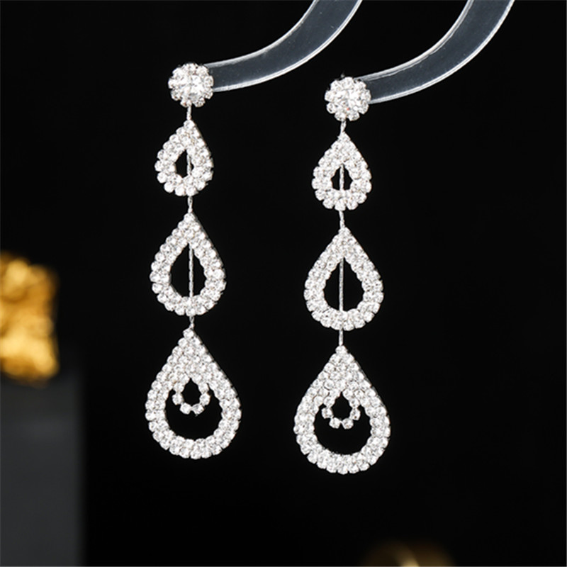 Glam Brillant Gouttelettes D'eau Strass Placage Évider Incrustation Strass Argent Plaqué Boucles D'oreilles Pour Femmes display picture 2