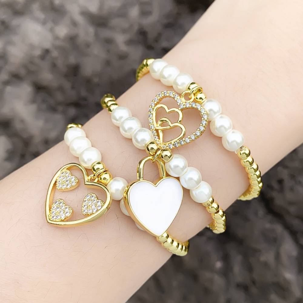 Fashion Simple Style Heart Shape Imitation Pearl Copper Charm Plating Inlay Shell Zircon Bracelets display picture 2