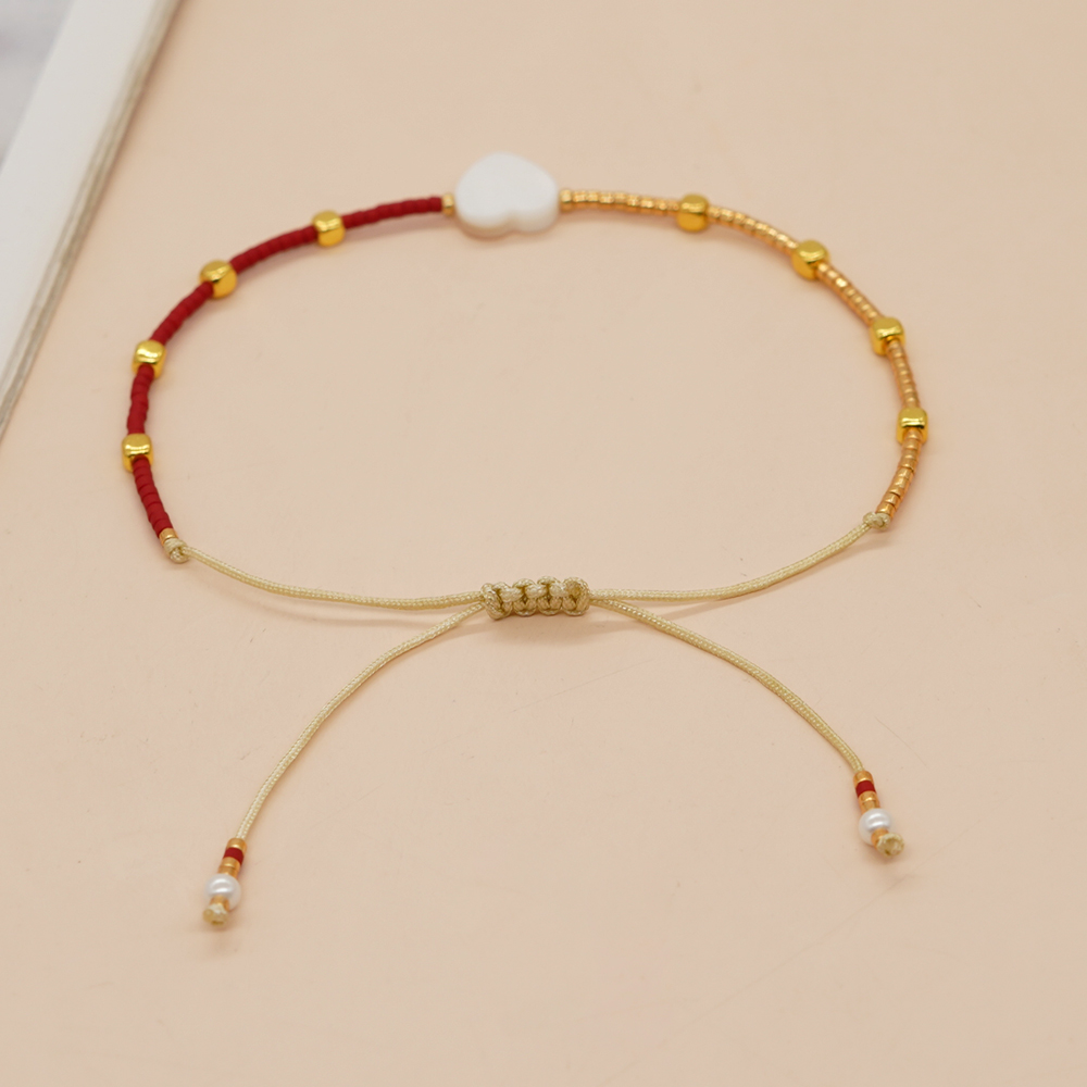 Handmade Heart Shape Glass Shell Beaded Unisex Bracelets display picture 4