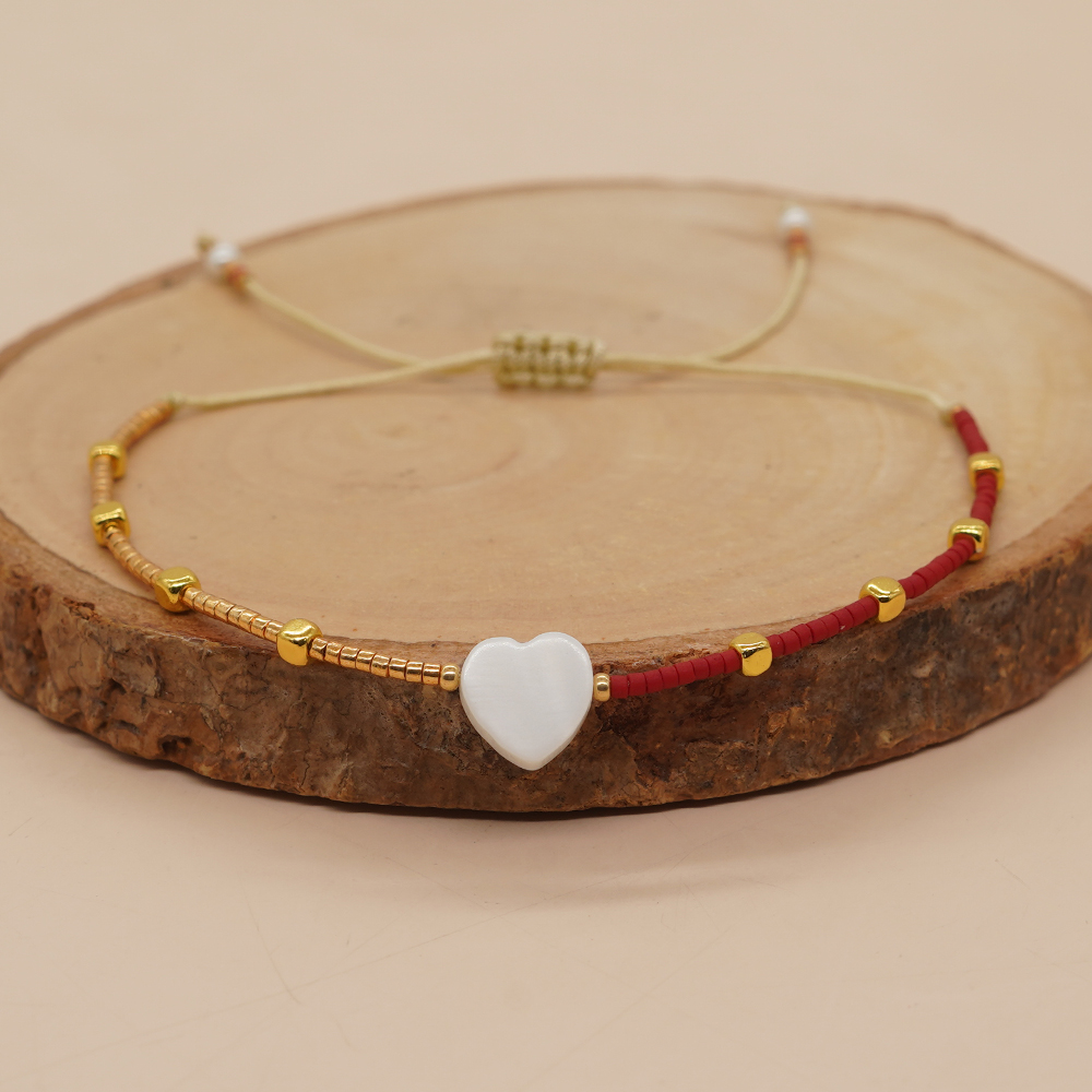 Handmade Heart Shape Glass Shell Beaded Unisex Bracelets display picture 1