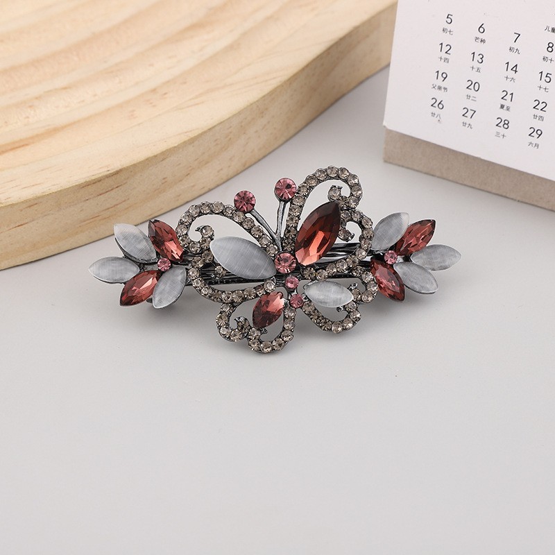 Luxurious Simple Style Korean Style Butterfly Alloy Inlay Rhinestones Opal Hair Clip display picture 1