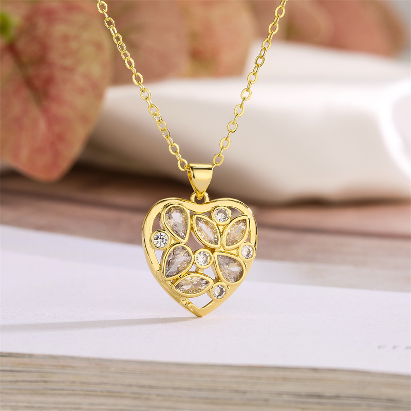 Simple Style Classic Style Water Droplets Heart Shape Copper Hollow Out Inlay Zircon Gold Plated Pendant Necklace display picture 5