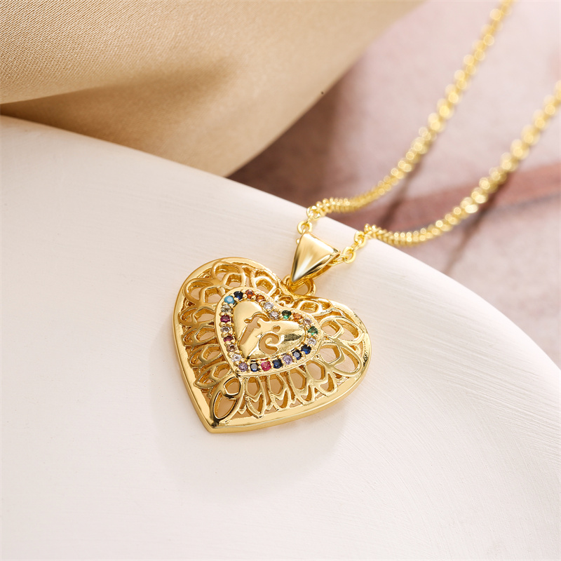 Simple Style Classic Style Water Droplets Heart Shape Copper Hollow Out Inlay Zircon Gold Plated Pendant Necklace display picture 8