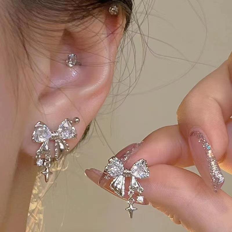 1 Pair Sweet Shiny Star Bow Knot Inlay Alloy Rhinestones Earrings display picture 1