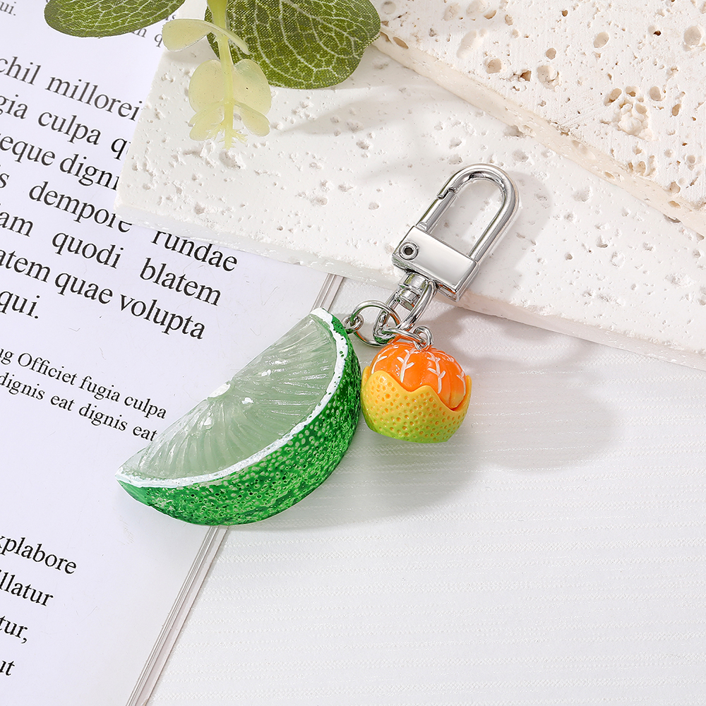 Cute Lemon Orange Fruit Alloy Resin Silica Gel Bag Pendant Keychain display picture 2