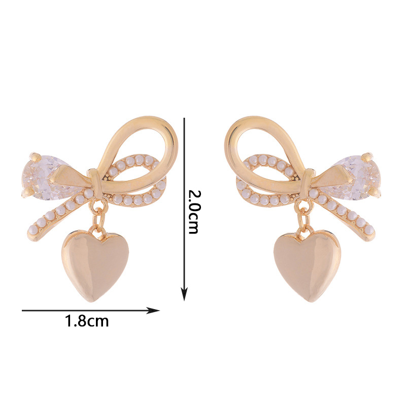 1 Pair Fairy Style French Style Simple Style Heart Shape Bow Knot Plating Inlay Copper Artificial Pearls Zircon 14k Gold Plated Ear Studs display picture 5