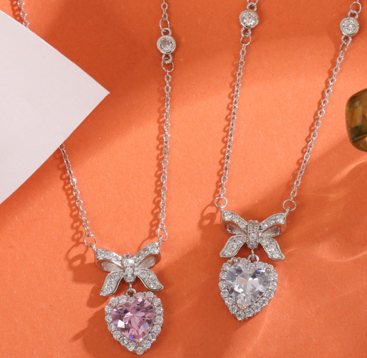 Sweet Korean Style Heart Shape Bow Knot Copper Plating Inlay Zircon Pendant Necklace display picture 1