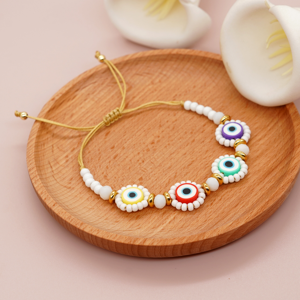 Cute Devil's Eye Smiley Face Flower Arylic Soft Clay Beaded Braid Women's Bracelets display picture 7
