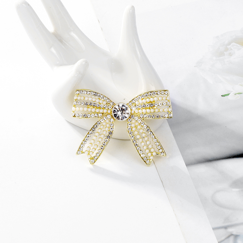 Elegant Bow Knot Alloy Inlay Artificial Pearls Rhinestones Women's Brooches display picture 9