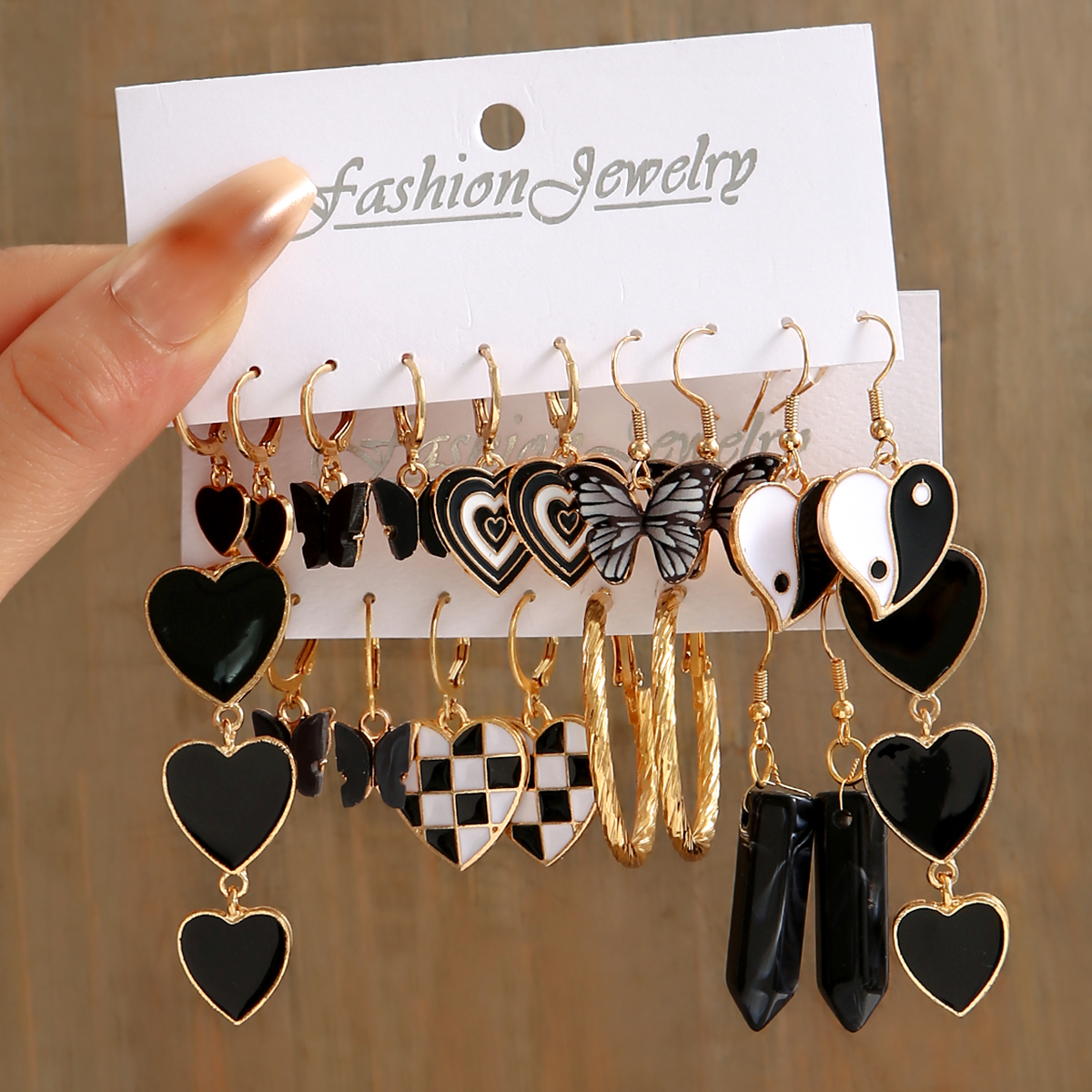 1 Set Retro Ethnic Style Gossip Heart Shape Butterfly Arylic Alloy Earrings display picture 3