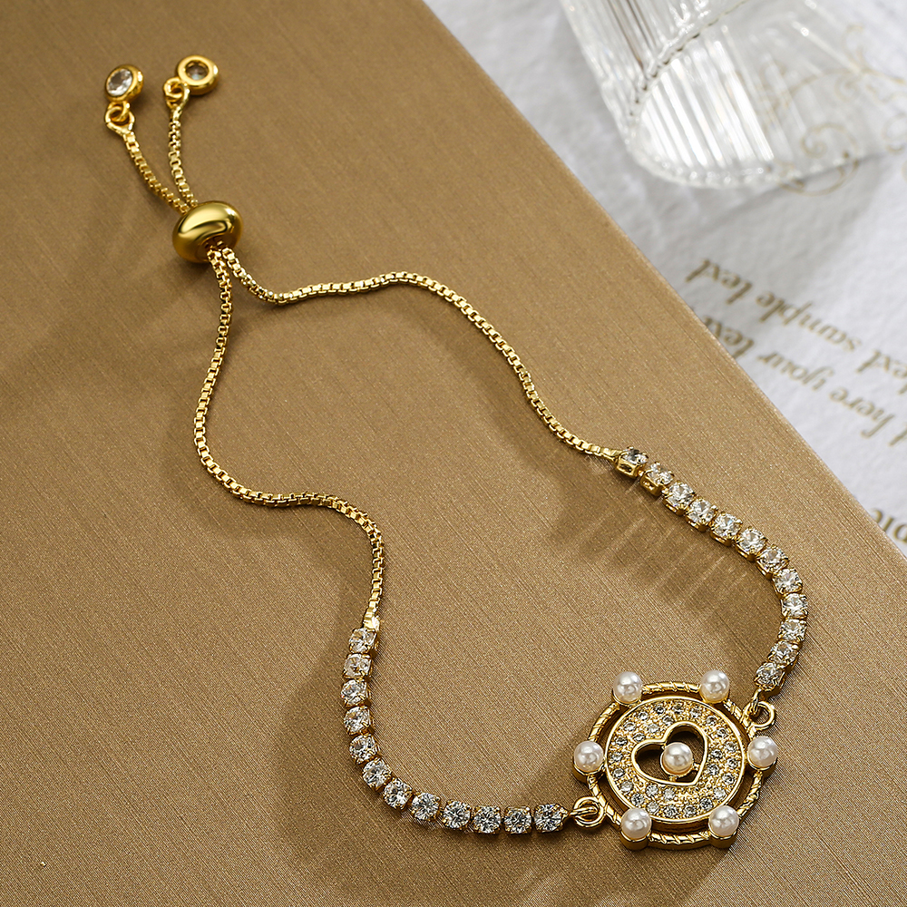 Style Simple Commuer Forme De Cœur Le Cuivre Plaqué Or 18k Perles Artificielles Zircon Bracelets En Masse display picture 2
