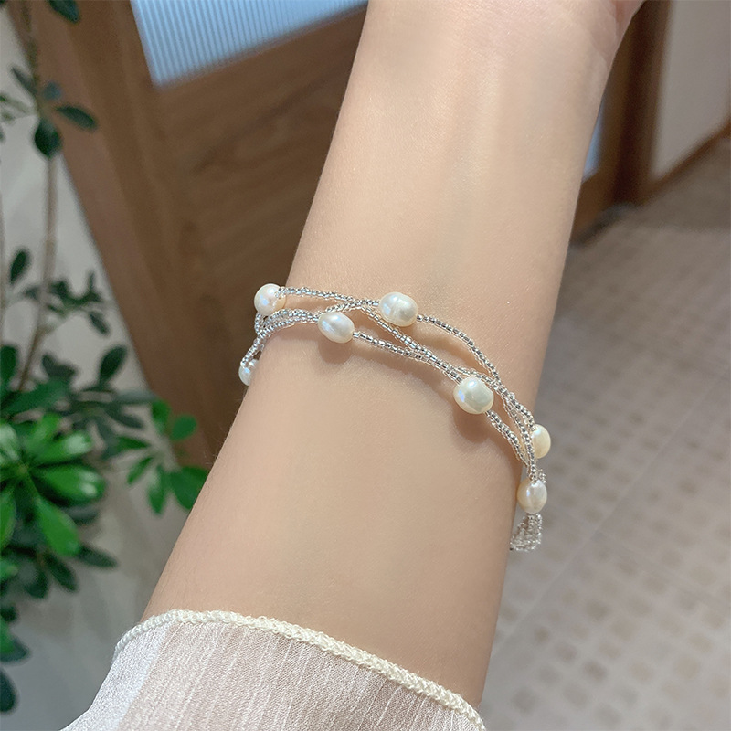 Casual Simple Style Four Leaf Clover Butterfly Daisy Baroque Pearls Ceramics Beaded Plating Braid White Gold Plated Women's Bracelets display picture 8
