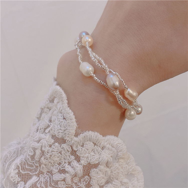 Casual Simple Style Four Leaf Clover Butterfly Daisy Baroque Pearls Ceramics Beaded Plating Braid White Gold Plated Women's Bracelets display picture 10