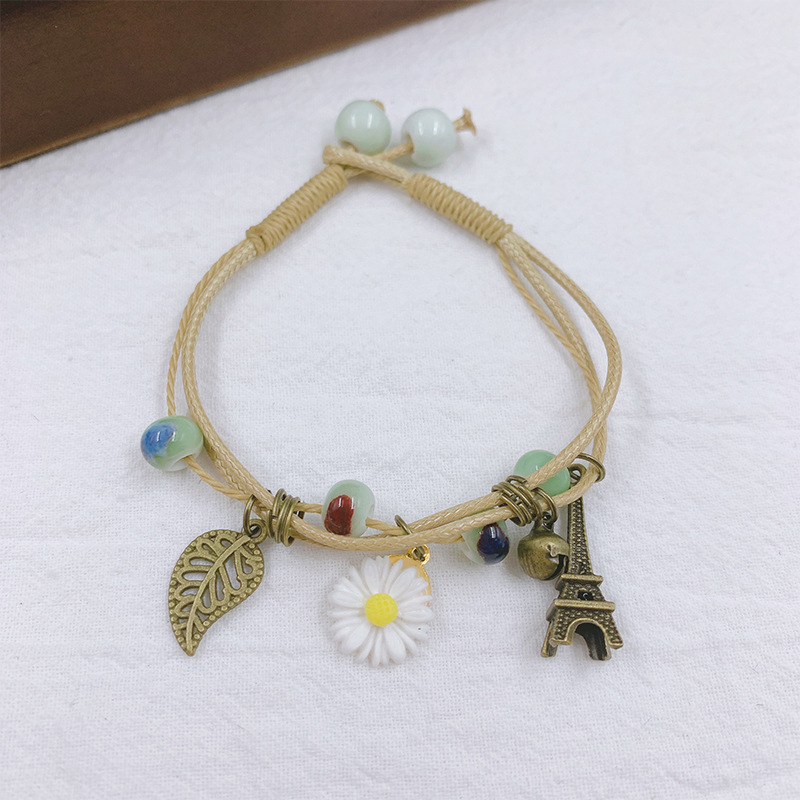 Casual Simple Style Four Leaf Clover Butterfly Daisy Baroque Pearls Ceramics Beaded Plating Braid White Gold Plated Women's Bracelets display picture 9